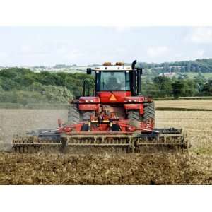  4 Wheel Drive Tractor Pulling a Disc Harrow, Cotswolds 