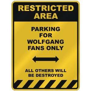  RESTRICTED AREA  PARKING FOR WOLFGANG FANS ONLY  PARKING 