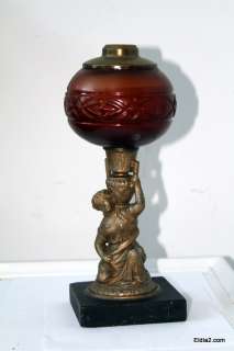 Victorian figural oil lamp  