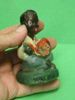 Black Boy with Mellon Heavy Cast Iron Paperweight repro  