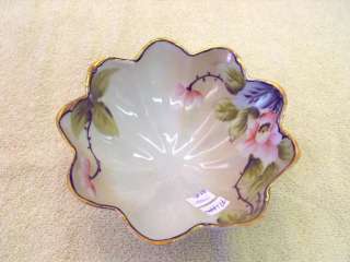  nine scallops. It is marked Hand painted Nippon. No chips or cracks