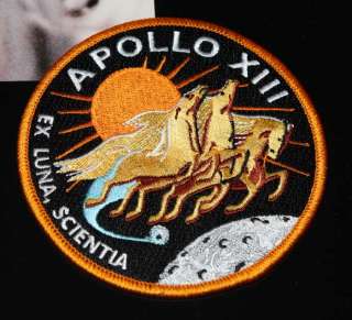 This exhibit also has an engraved silver plaque that reads APOLLO 13 