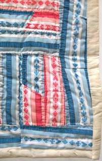 African American quilt in vivid, folky pinwheel pattern  