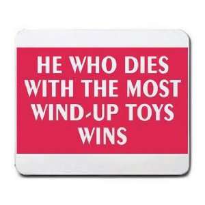   HE WHO DIES WITH THE MOST WIND UP TOYS WINS Mousepad