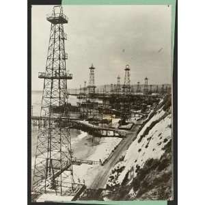   petroleum industries pour out fuel,oil well derricks,California Coast