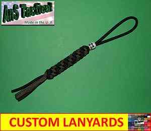   Tactical Knife Lanyard 550 cord skull bead, round weave, with tails
