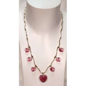   NJ Design pink Sworoski heart necklace in 2.8 g of 18K gold Jewelry
