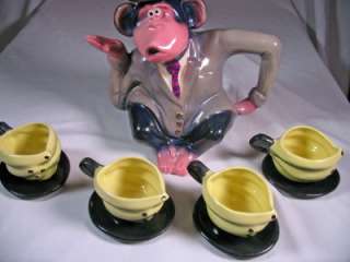Traveling Monkey teapot with 4 Banana Cups and Saucers  