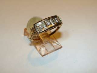 Estate Diamond and 14 Karat 3  stone filigree ring  