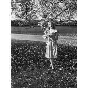  Portrait of Young Woman Standing Under Magnolia Tree in 