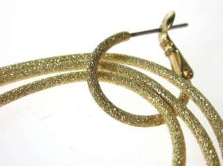  Metallic Gold Tone Oval Hoops Earrings. A beautiful pair of earrings 